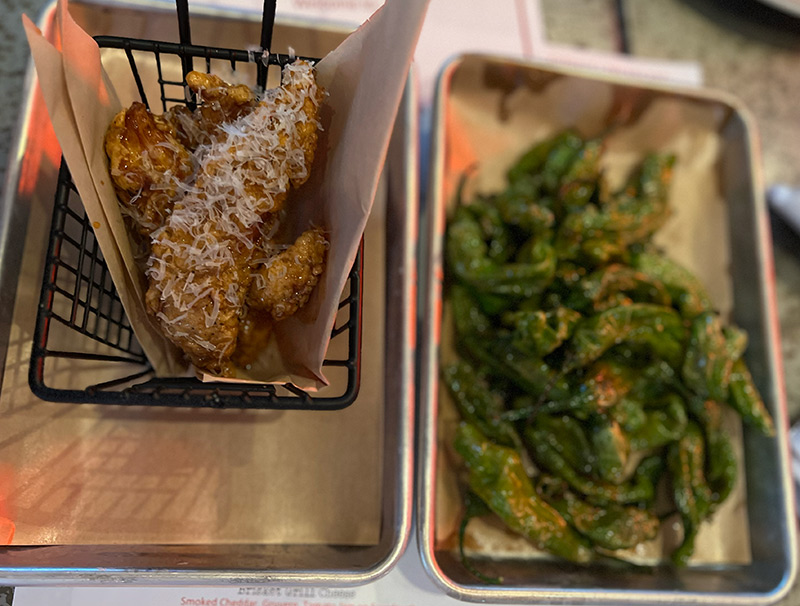 mabel's bbq starters chicken tenders and shishito peppers